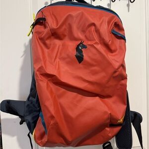 Red and Blue Cotopaxi Travel Pack